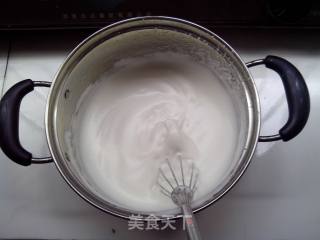 松软可口色泽金黄的———电饭锅海绵牛奶葡萄干蛋糕的做法步骤：7