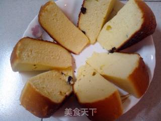 松软可口色泽金黄的———电饭锅海绵牛奶葡萄干蛋糕的做法步骤：13