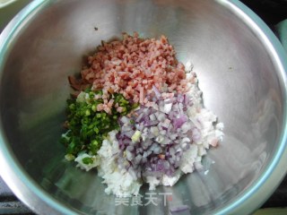鹌鹑蛋豆腐丸子的做法步骤：3