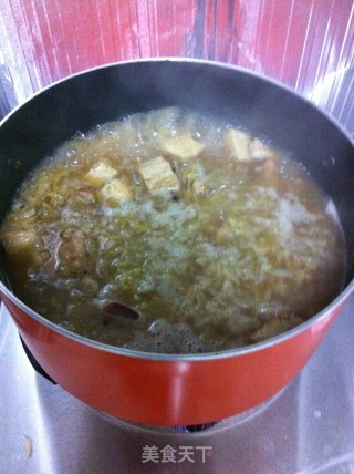 东北家常菜—脊骨酸菜炖冻豆腐的做法步骤：9