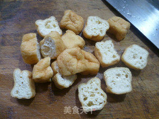梅豆油豆腐烧腊鸡腿的做法步骤：4