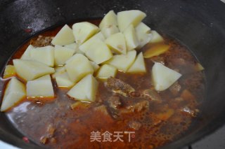 土豆烧牛肉的做法步骤：16