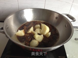 百叶结土豆炖排骨的做法步骤：6