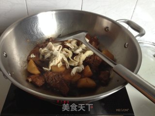 百叶结土豆炖排骨的做法步骤：7