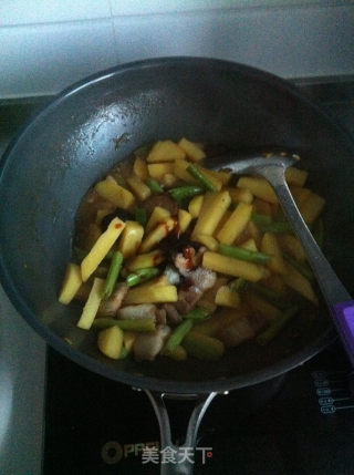 土豆炒肉的做法步骤：11