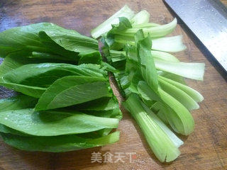 青菜排骨炒年糕的做法步骤：3