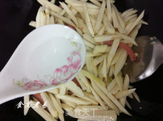 茭白炒火腿的做法步骤：7