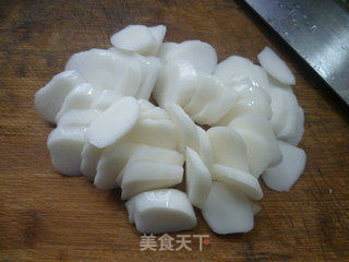 梅干菜肉丝炒年糕的做法步骤：2