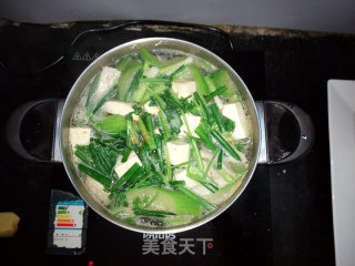水瓜鱼腩豆腐汤的做法步骤：7