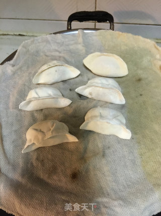 酸菜猪肉馅饺子的做法步骤：11