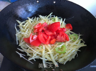 土豆丝炒番茄的做法步骤：5