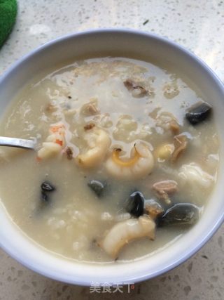 皮蛋瘦肉海鲜粥的做法步骤：4