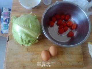 鸡蛋头菜小番茄的做法步骤：1