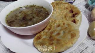 榄菜瘦肉粥的做法步骤：11