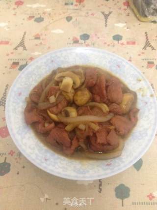 洋葱蘑菇炒牛柳的做法步骤：9