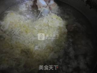大骨头炖酸菜的做法步骤：7