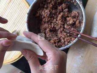 牛肉圆葱蒸饺的做法步骤：23