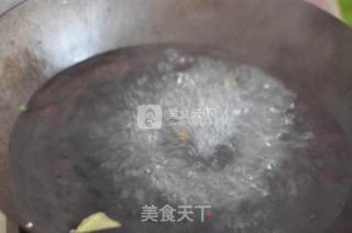 葱爆花甲螺的做法步骤：5