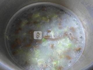圆白菜牛筋丸大米粥的做法步骤：7