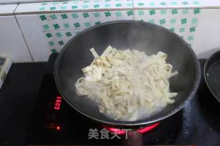 韭菜炒干豆腐的做法步骤：7