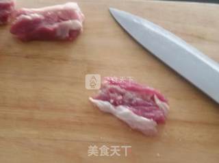 五花肉辣白菜垫豆腐的做法步骤：2