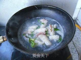 韭菜炒鱿鱼的做法步骤：7