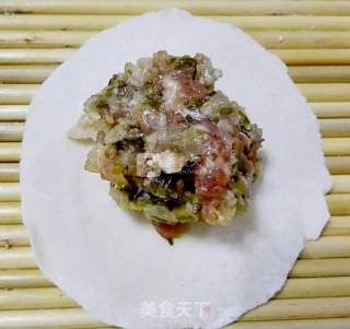 酒糟酸菜土猪肉水饺的做法步骤：6