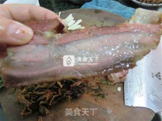 干四季豆炖烟熏腊排骨的做法步骤：2