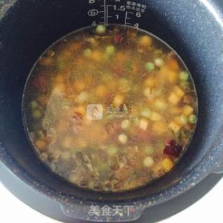 腊肉豌豆红薯焖饭的做法步骤：14