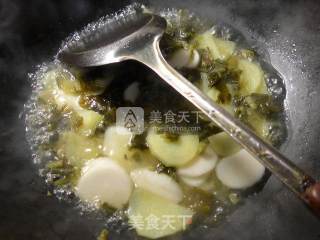 雪菜土豆煮年糕的做法步骤：5