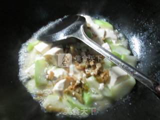 榨菜丝豆腐煮夜开花的做法步骤：7