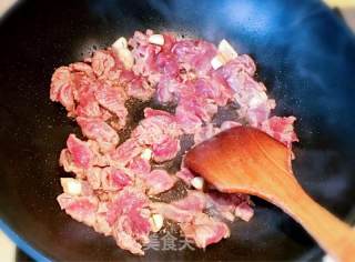 韭菜花炒牛肉的做法步骤：6
