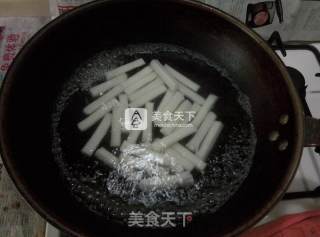 香辣花蛤炒年糕的做法步骤：2