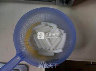 香辣花蛤炒年糕的做法步骤：3