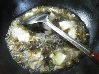 猪肉酸菜豆腐汤的做法步骤：4