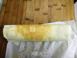 葡萄干黑芝麻夹心蛋糕卷的做法步骤：9