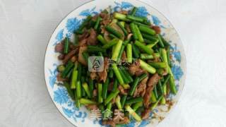 家常菜：肉片炒蒜苔的做法步骤：6