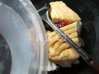 黑木耳茭白煮兰花豆腐干的做法步骤：4