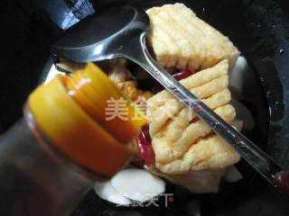 黑木耳茭白煮兰花豆腐干的做法步骤：5