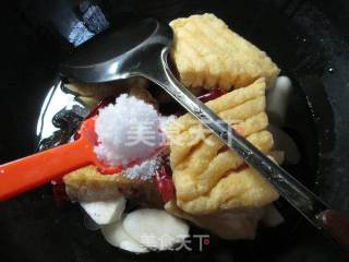 黑木耳茭白煮兰花豆腐干的做法步骤：7