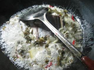 腌白菜煮鳗鱼的做法步骤：6