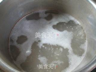 青菜黄豆排骨大米粥的做法步骤：4