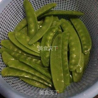 鱿鱼炒荷兰豆的做法步骤：4