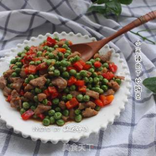 小米辣肉丁炒豌豆的做法步骤：9