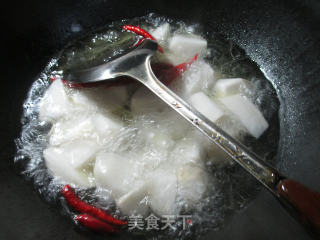 千张结烧萝卜的做法步骤：3