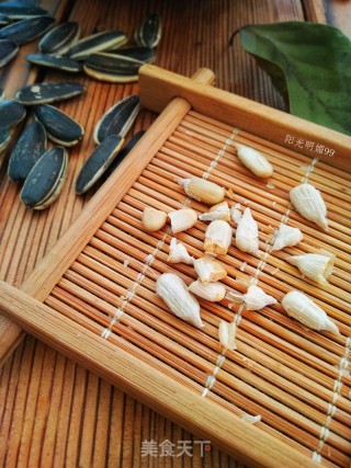 坤博砂锅炒瓜子的做法步骤：13