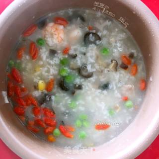 养生海鲜粥的做法步骤：9