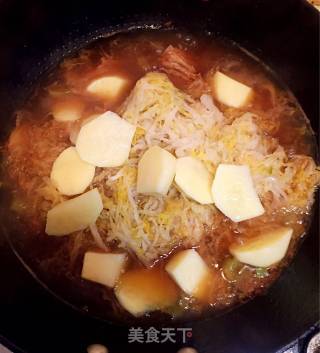 酸菜土豆炖排骨的做法步骤：5