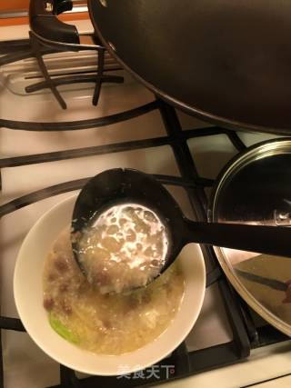免治牛肉窝蛋粥的做法步骤：5