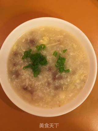免治牛肉窝蛋粥的做法步骤：6